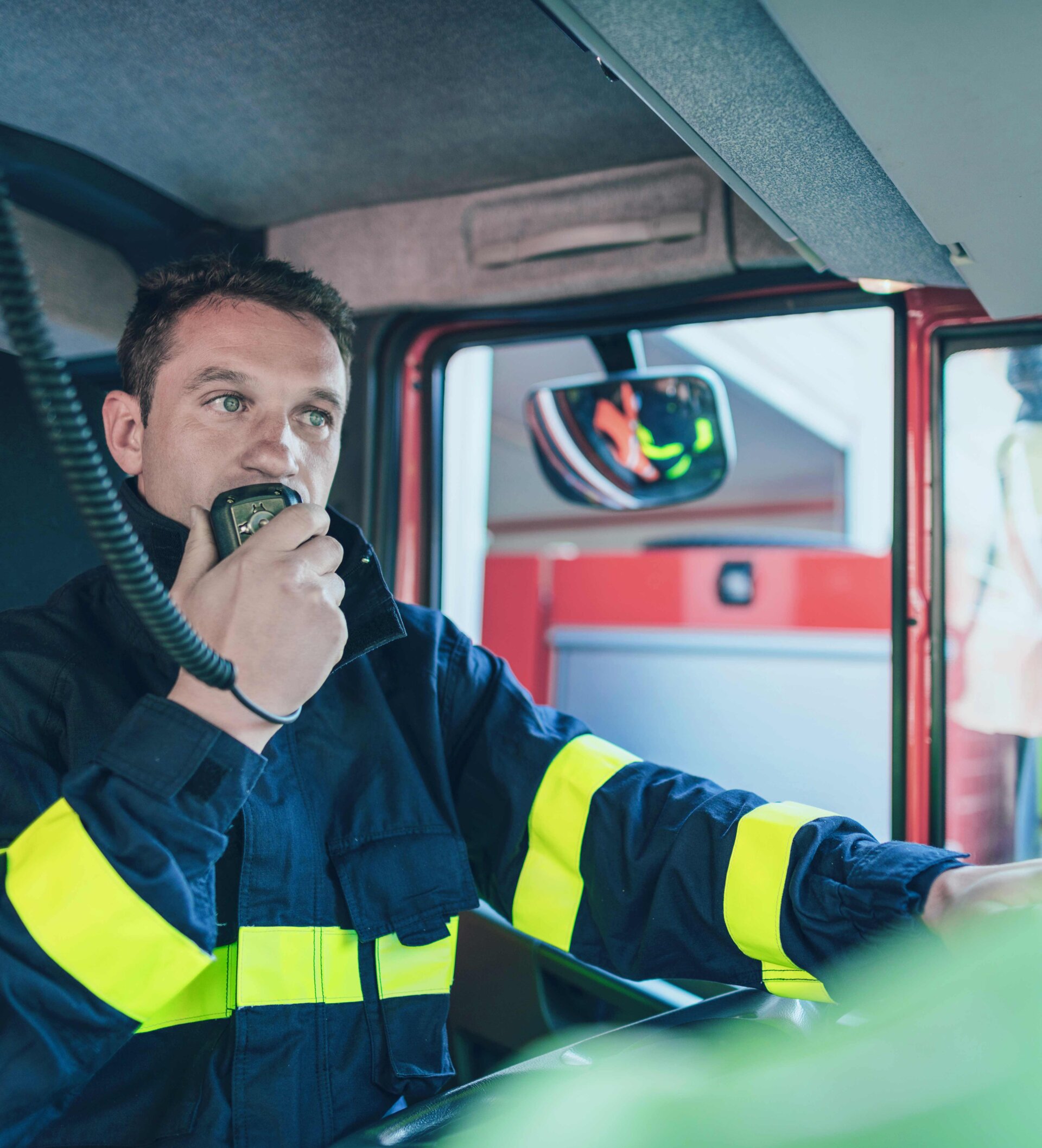 Firefighter with radio on duty